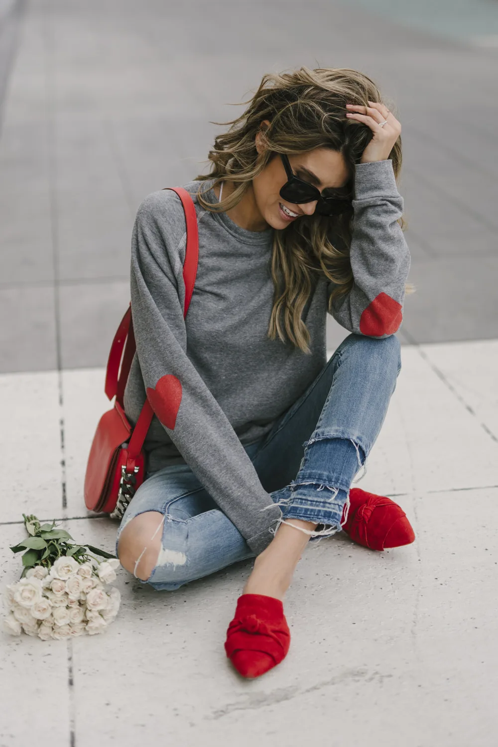 Red shoes and grey t-shirt