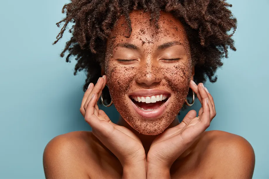 a woman with a facial mask on her face.