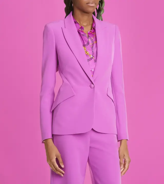 fitted one-button blazer with sharp peaked lapels and angled pockets
