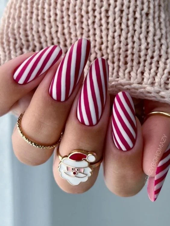 Playful Candy Cane Nails for a Festive Christmas Look