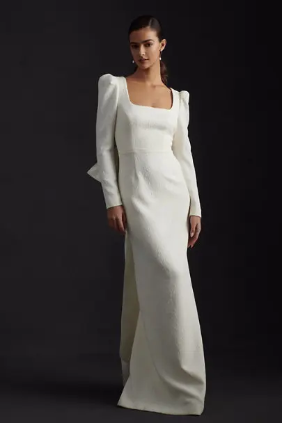 open-backed, fitted gown